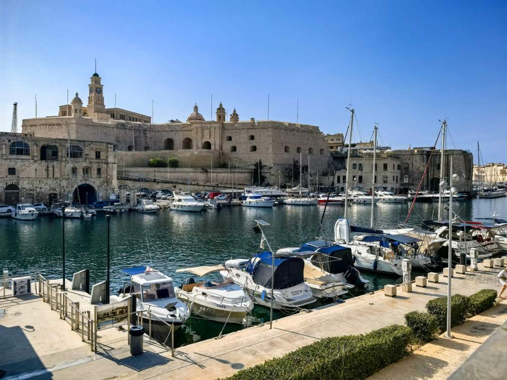 A Guide to Malta’s Three Cities: Discover Birgu, Isla and Bormla View from the Bormla (Cospicua) waterfront across the yacht marina in Dockyard Creek towards the fortifications of Isla (Senglea).